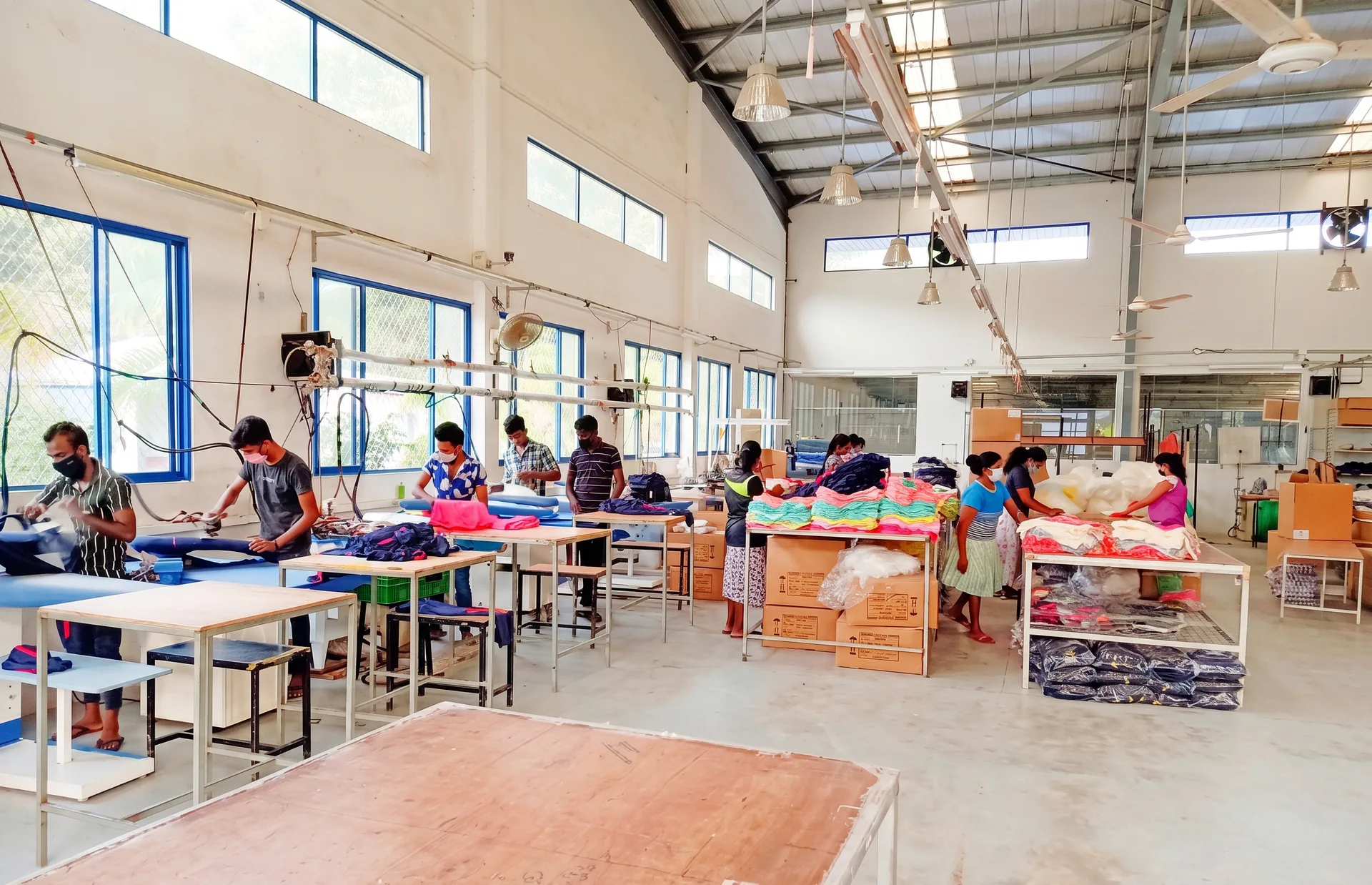 Finishing team checking and packing garments